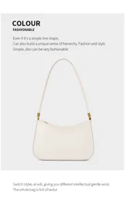 Detailed view of the minimalist white leather shoulder bag, elegant gold hardware accent.
