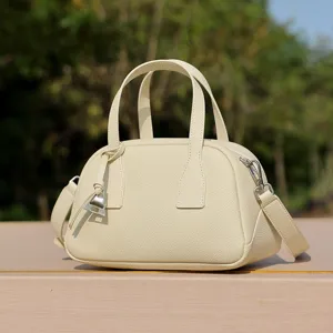 Borsa a mano bowling in vera pelle hobo tracolla per donna elegante borsa color crema chic.