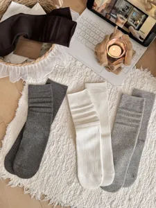 Comfortable ribbed knit long socks in versatile colors, perfect for daily wear and autumn style.