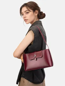 Genuine leather shoulder bag for women, elegant underarm handbag, versatile commuter daily use.