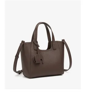 Dark brown leather tote bag detail, casual daily shoulder bag with cute elephant charm, spacious.