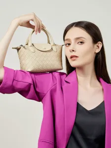 Chic beige leather woven mini handbag, stylish dumpling tote bag for women daily fashion.