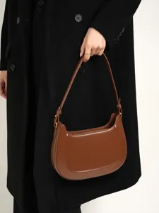 Elegante bruine lederen schoudertas voor dames, klassieke vintage tas voor dagelijks gebruik.