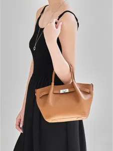 Elegante borsa a mano marrone in pelle da donna, borsa a secchiello chic con serratura.