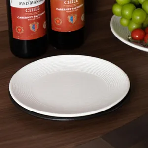 Japanese style ceramic shallow plate, minimalist white grooved dinner dish for steak and pasta.