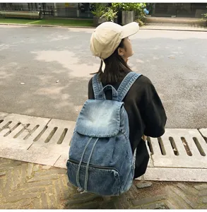 Vintage denim canvas backpack for women, casual large capacity travel school daypack.
