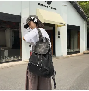 Retro vintage denim backpack for women, large capacity casual canvas school book bag chic style.