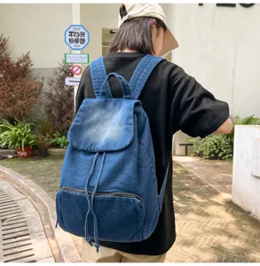 Casual blue denim backpack for women, large capacity stylish school book bag with drawstring.