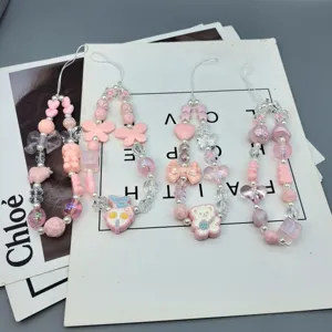 Schattige roze kraal telefoonkoord polsband strik acryl kristal voor dames meisjes