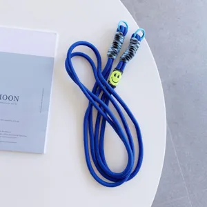 Blue crossbody phone lanyard with double buckle and smiley face decoration, durable strap.