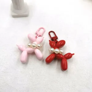 Cute balloon dog keychain set with pearl collar, acrylic bag pendant and cute key ring accessories.