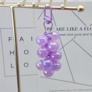 Purple acrylic AB color grape keychain charm, shiny electroplated fruit bag pendant.