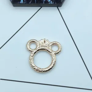 Gold metal spring keyring with crown and bear ears design, perfect for DIY crafts and keychains.