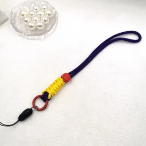 Sangle de poignet tressée pour téléphone, bicolore réglable, lanière anti-perte pour clés et mobile.