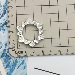 Silver metal spring keyring flower leaf shape charm hardware accessory detail view