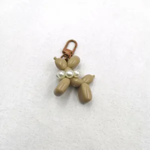 Acrylic balloon dog keychain detail, cute animal keyring pendant for bags and phone cases.