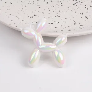 Detailed closeup of an iridescent acrylic balloon dog charm, perfect for DIY jewelry making.
