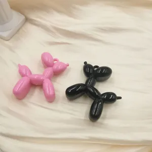 Acrylic balloon dog keychain charm detail view, cute animal pendant for phone case DIY.