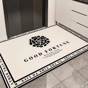 Modern waterproof PVC entryway doormat, non-slip black and white floor rug for home decor.