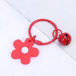 Cute red flower keychain with metal ring and small bell, perfect DIY bag and phone charm