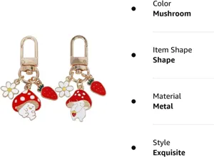 Metal mushroom keychain charm with cute strawberry and flower pendants for stylish bags.