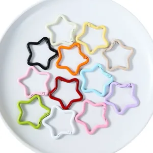 Colorful star-shaped metal spring buckles, perfect for DIY keychains and jewelry accessories.