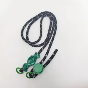 Close-up detail of the adjustable braided phone lanyard with green accents and metal rings.