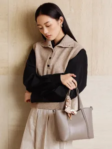 Genuine leather tote bag for women, stylish commute handbag with shoulder strap and chic silk scarf.