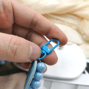 DIY candy color beaded phone strap charm with blue metal clasp and acrylic beads.