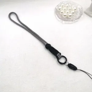Dragonne de téléphone tissée noire et blanche bracelet réglable porte-clés cordon