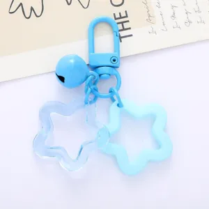Blue star acrylic keychain charm detail view, cute bag pendant and DIY accessory showcase.