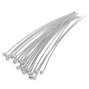 Detailed close-up shot of silver headpins, essential DIY jewelry making accessories.