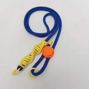 Details of the blue and yellow crossbody phone lanyard with adjustable plastic buckle.