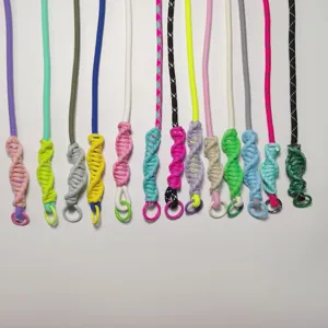 Colorful nylon crossbody phone lanyard with braided spiral knot and metal ring for universal cases.