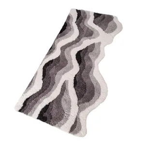 Alfombra floca de ondas irregulares gris negro blanco estera estética abstracta moderna
