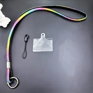 Detailed view of luxury rhinestone phone lanyard with sparkling crystals, anti-loss strap.