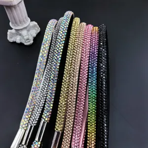 Sparkling rhinestone phone lanyard detail showing various vibrant crystal colors and fine texture.