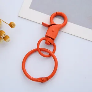 Vibrant orange metal lobster clasp and split ring set, perfect for DIY keychains and accessories.