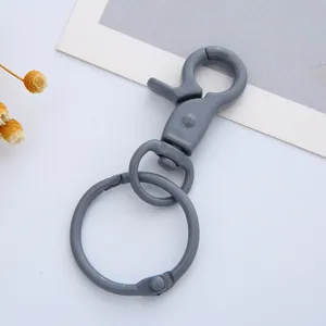 Grey painted lobster clasp keychain metal ring DIY accessory detail view showing hook and loop.