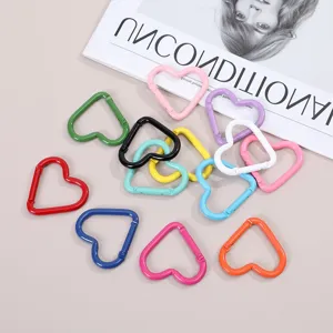 Colorful heart-shaped alloy carabiners, spring clips, and keychain DIY jewelry accessories.