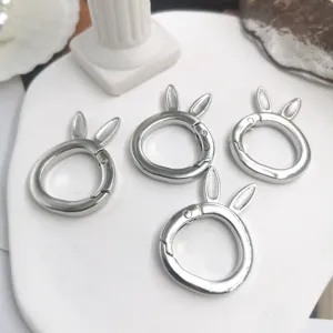 Anelli portachiavi a molla con orecchie di coniglio in metallo argento accessorio borsa.