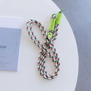Colorful woven crossbody phone lanyard with double buckles and cute smiley face charm.
