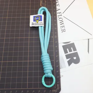 Light blue woven nylon lanyard keychain, durable bag strap detail view for daily use.