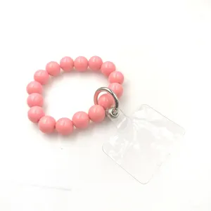 Bracelet de perles roses pour téléphone avec languette transparente, accessoire mignon.