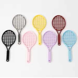 Set of 7 colorful mini tennis racket charms pendants for DIY jewelry making keychains.
