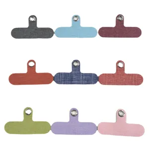 Kit de languettes d'attache universelles pour cordon de téléphone en tissu avec œillet.