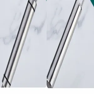 Stainless steel potato masher handle close-up detail, essential durable kitchen tool.