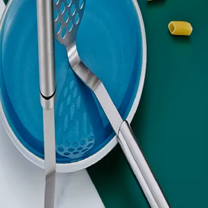 Stainless steel potato masher detail, ergonomic handle and durable kitchen tool for daily cooking.