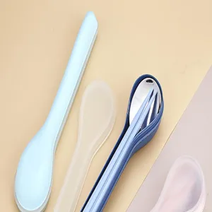 Detailed view of portable travel tableware set with stainless steel chopsticks and spoon.