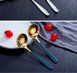 Stainless steel soup spoon set with golden bowl and blue handle, detail view for dining table.